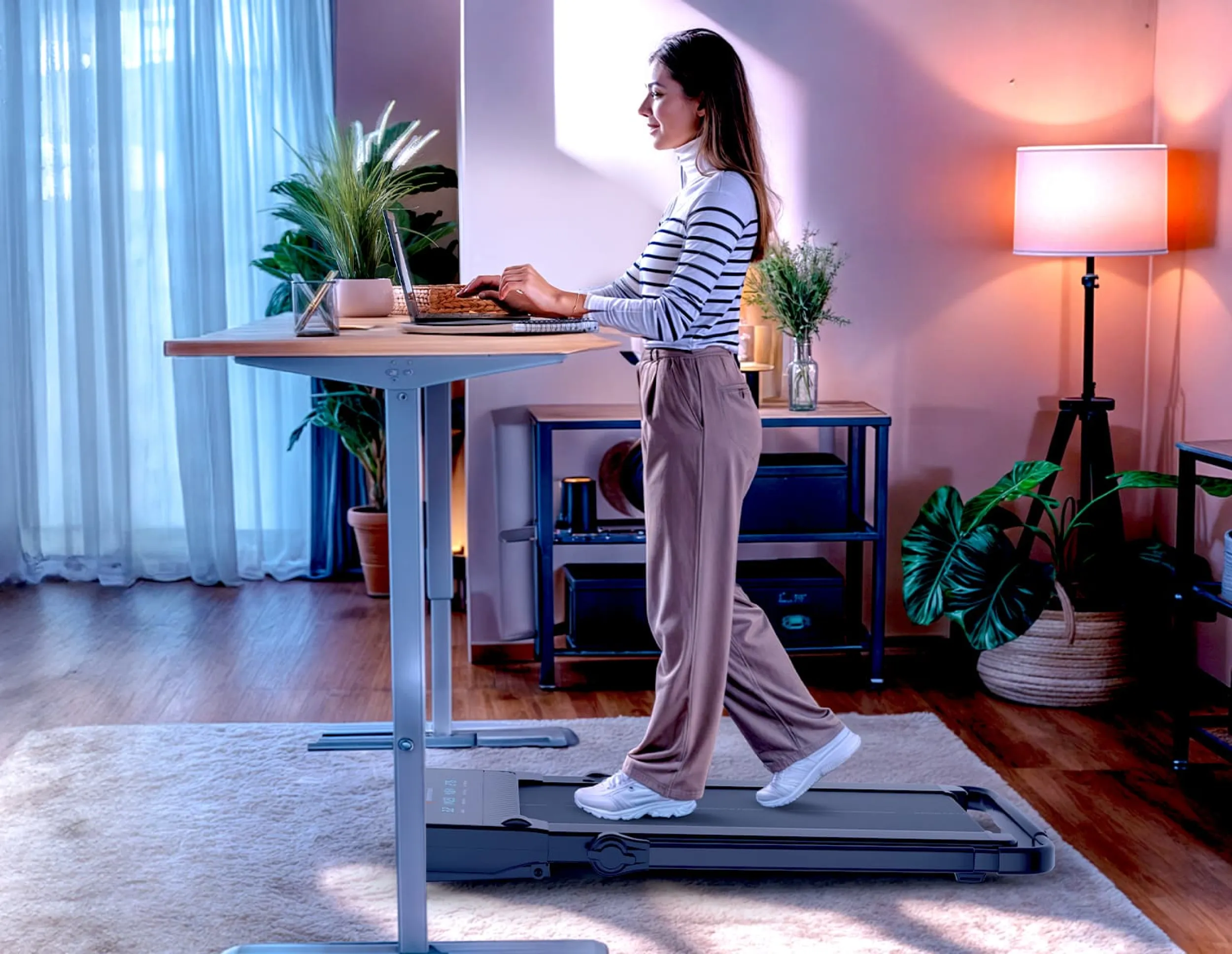 Home office with standing desk and treadmill